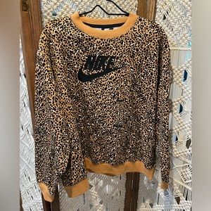 NWT Nike Women’s Cheetah sweater. Size XL